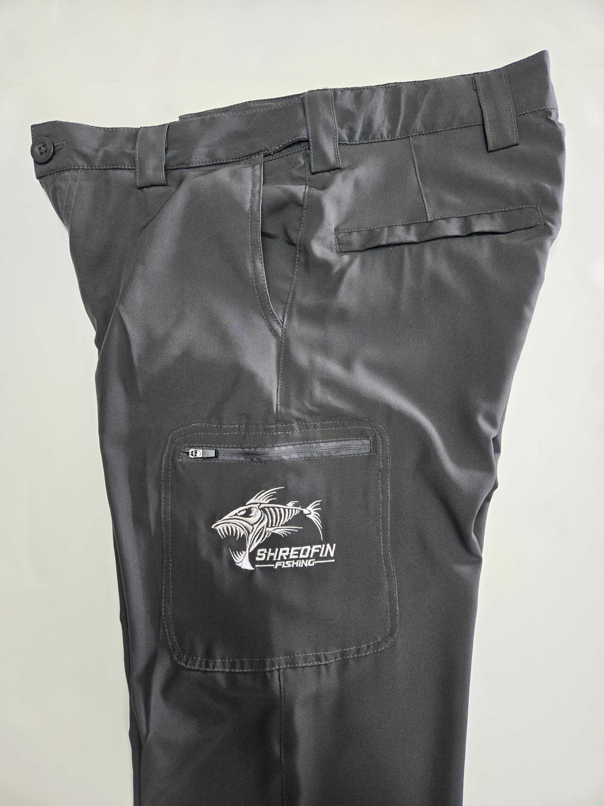 Close up showing the left cargo pocket on ShredFin fishing HookSet Pants